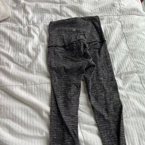 Lululemon black checkered and gray long leggings. Size two.